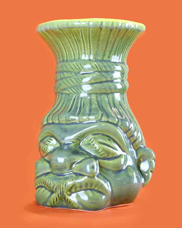 Ceramic shrunken head tiki mug green