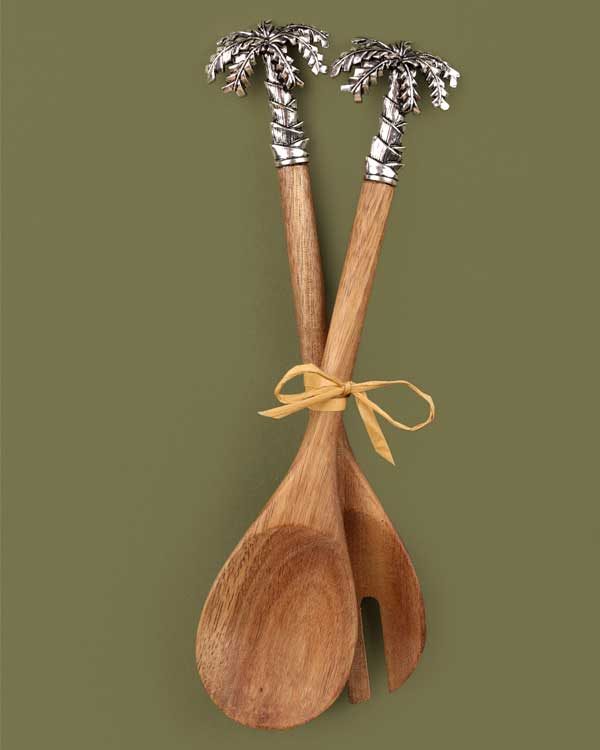 Wooden salad tongs tipped with metal palm trees