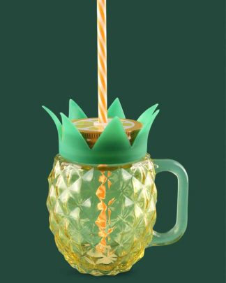 Mason glass with straw shaped like a pineapple