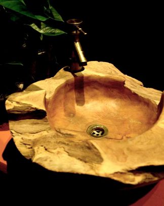 Teak root sink with brass tap installed in Mahiki