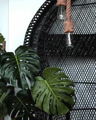 Artificial Monstera Plant with black princess chair and nautical rope pendant