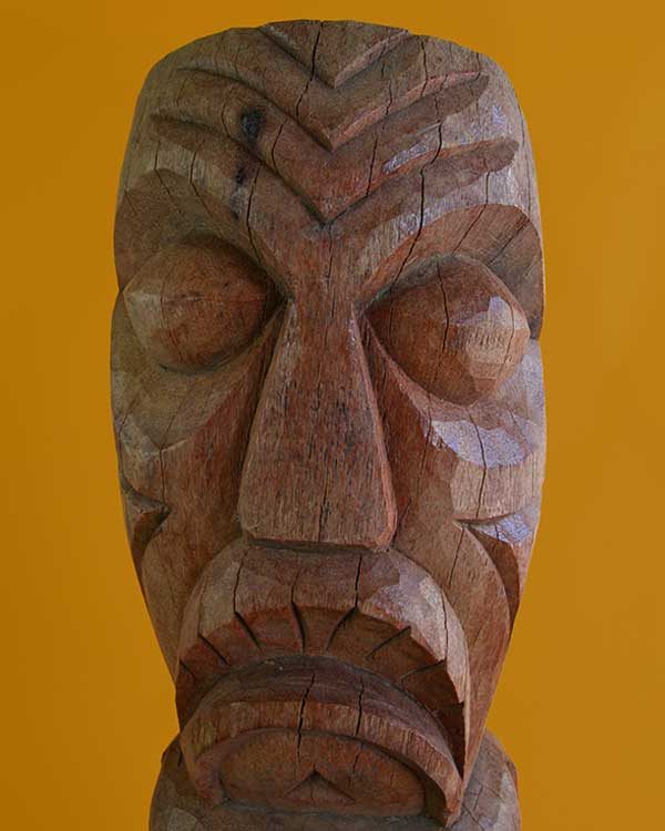 Hand carved wooden Tiki cannibal design