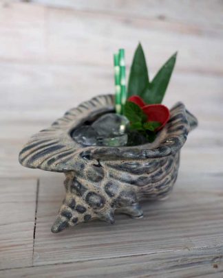 Ceramic Tiki mug conch shell styled as a drink with paper straws