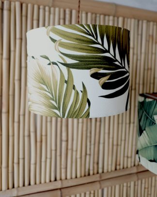 Tropical print lampshade on bamboo background
