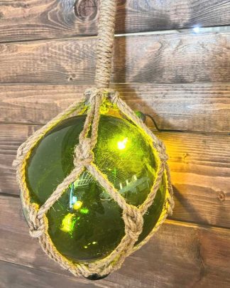 This is am image of a Tiki Fish Float Light in Green