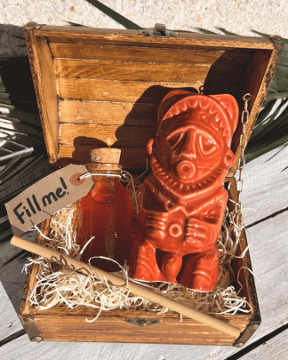 This photo is of a Tiki mug gift set, comprising of a Papu Tiki Mug, mini bottle for a tipple of your choice and a bamboo re-useable straw.