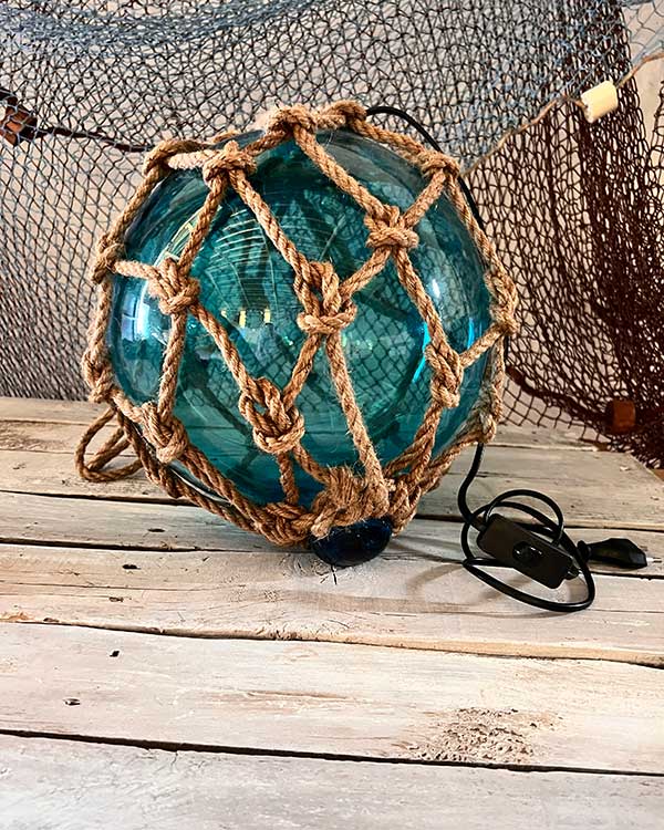 VINTAGE TURQUIOSE FISH FLOAT LIGHT SHOWING CABLE WEB