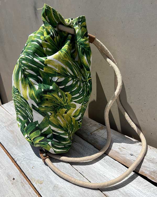 TROPICAL GREEN LEAF BACK PACK WITH ROPE STRAPS SIDE VIEW